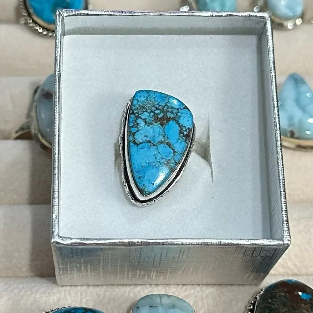 Turquoise gemstone, silver overlay ring stamped 925‎  oval adjustable 5-8